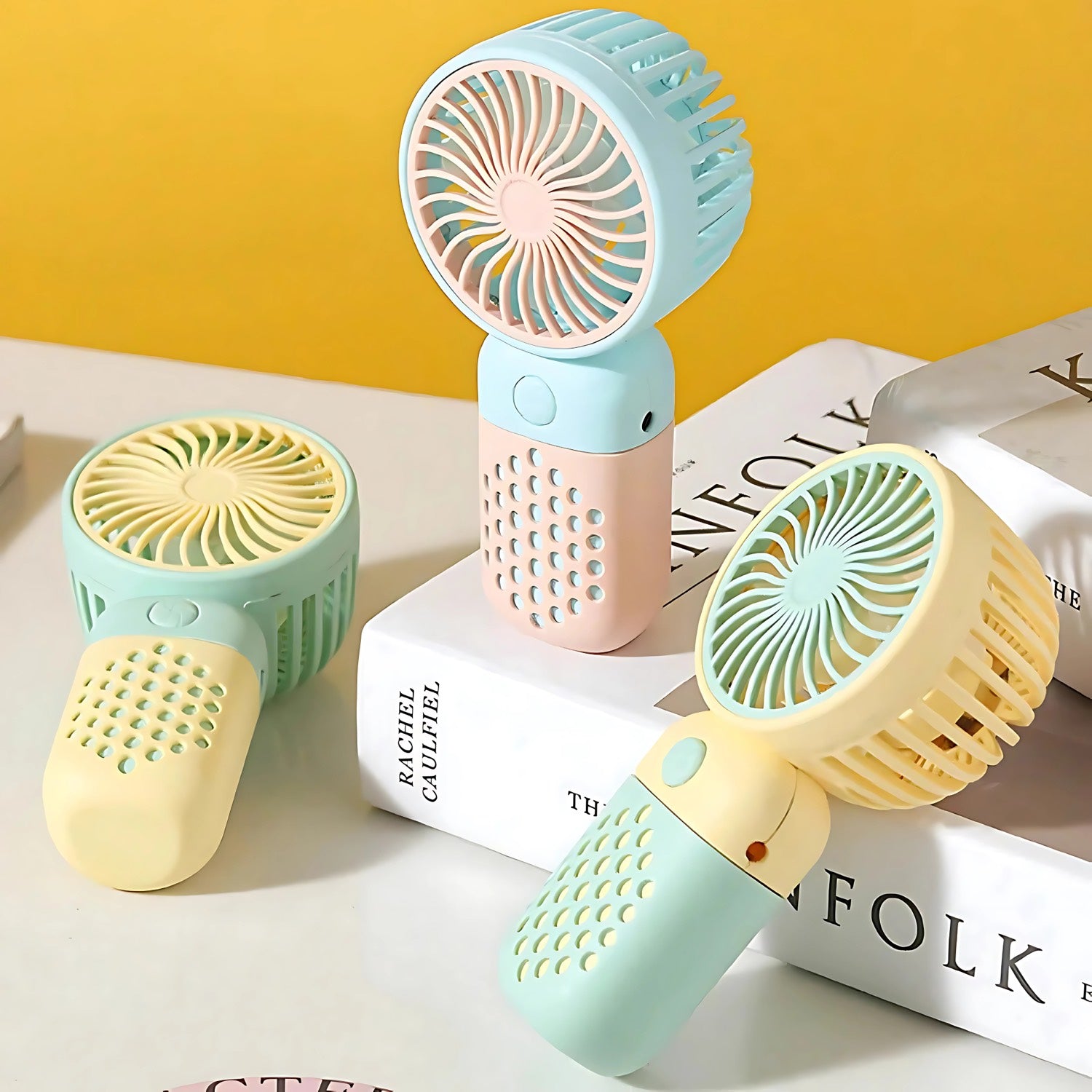 Product photo of Mini Handheld Fan, the best Powered Hand Fans & Misters gift idea for sale on Glenmore, a store where you can find the perfect Electronics for your home, hobbies, video games, or gifting—all in one place, curated for you.